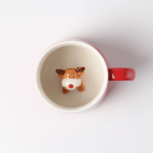 Santa Claus reindeer small sculpture in red cup